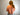 Back of the Tribal Chakra Radical Magical Crop Hoodie in the color Beach Baby Coral